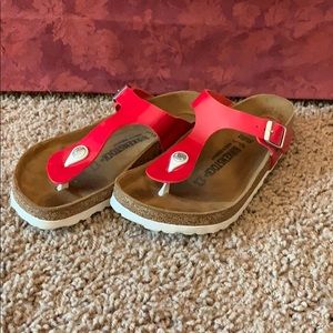 Red flip flop Birkenstock’s